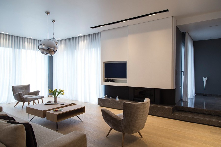 Μια κατοικία σε γήινους τόνους όπου κυριαρχεί η ηρεμία- Φωτογραφία 1