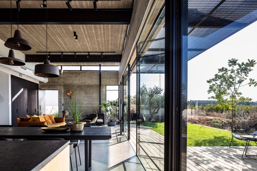 Μια μαγική ισόγεια κατοικία με αδρά βιομηχανικά υλικά και φιλόξενη φωτεινή ατμόσφαιρα- Φωτογραφία 5