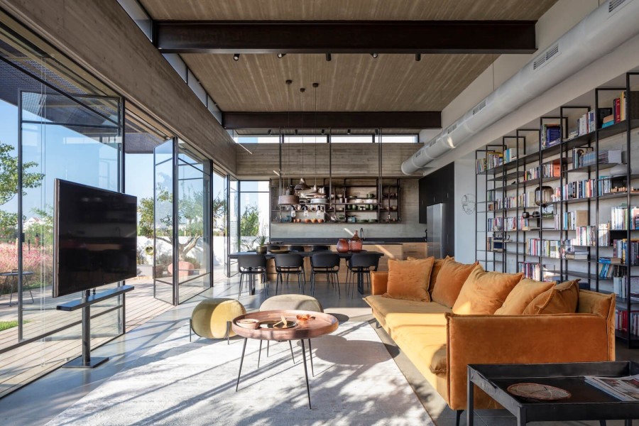 Μια μαγική ισόγεια κατοικία με αδρά βιομηχανικά υλικά και φιλόξενη φωτεινή ατμόσφαιρα- Φωτογραφία 1